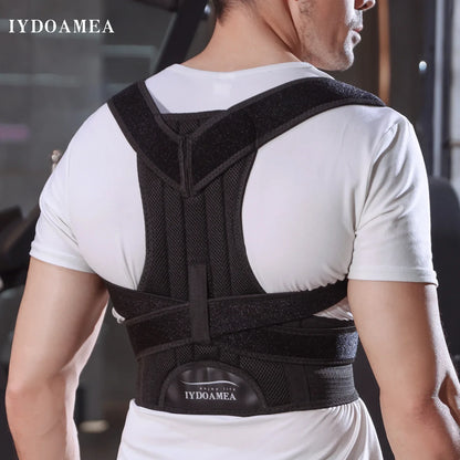 Man wearing black posture corrector back brace over white shirt in gym setting